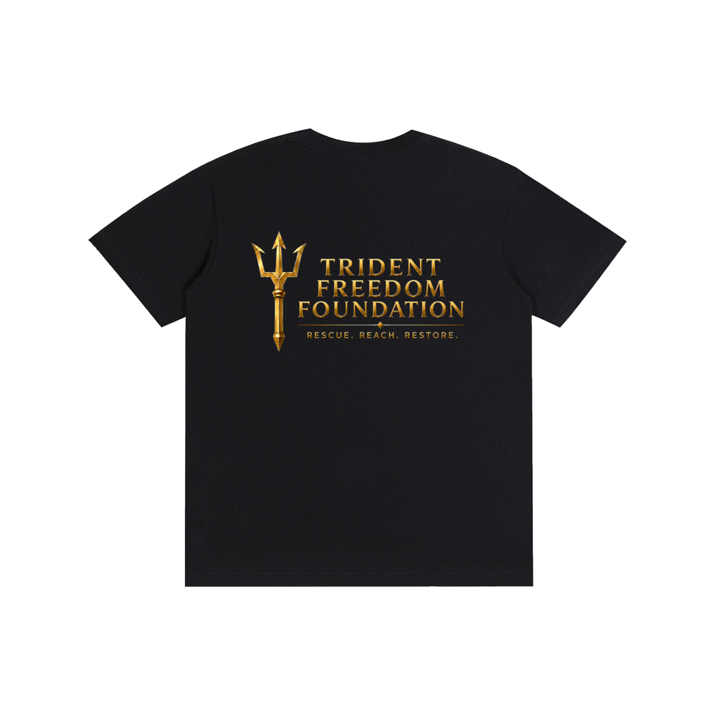A black short-sleeve t-shirt with a gold graphic on the front featuring a trident and the text 'TRIDENT FREEDOM FOUNDATION' and 'RESCUE. REACH.